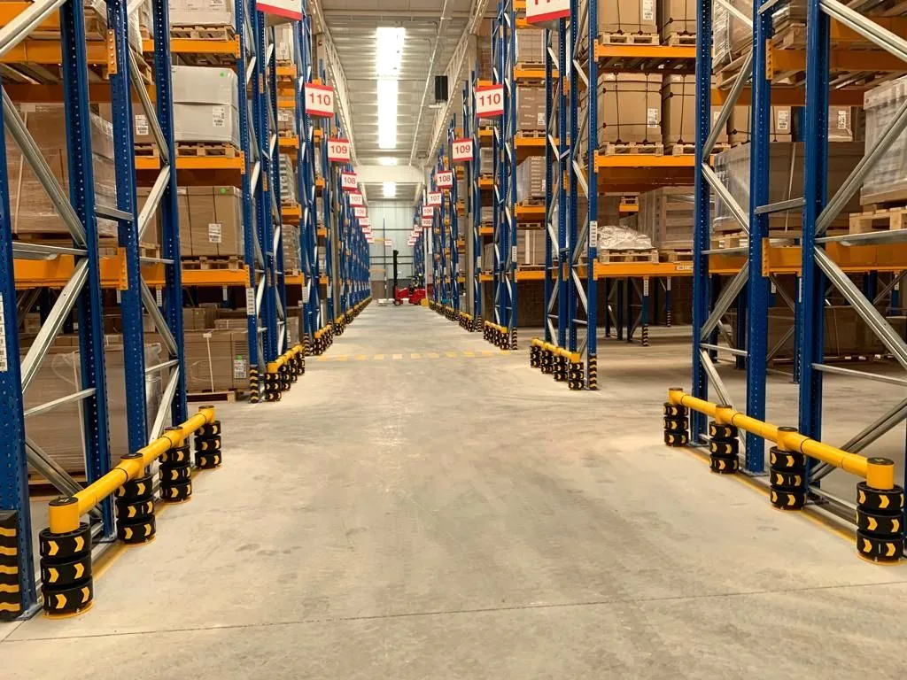 ENNAT rack protection along a high-bay aisle at an IKEA warehouse