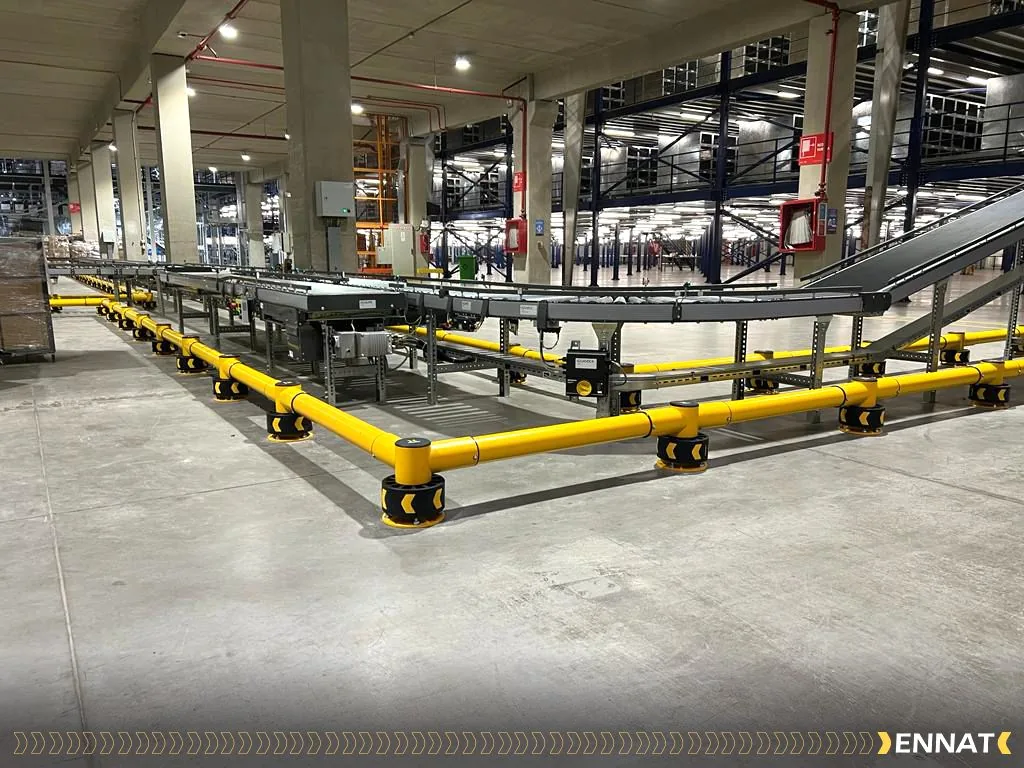 ENNAT guardrails around conveyor equipment at a TRICOT distribution center