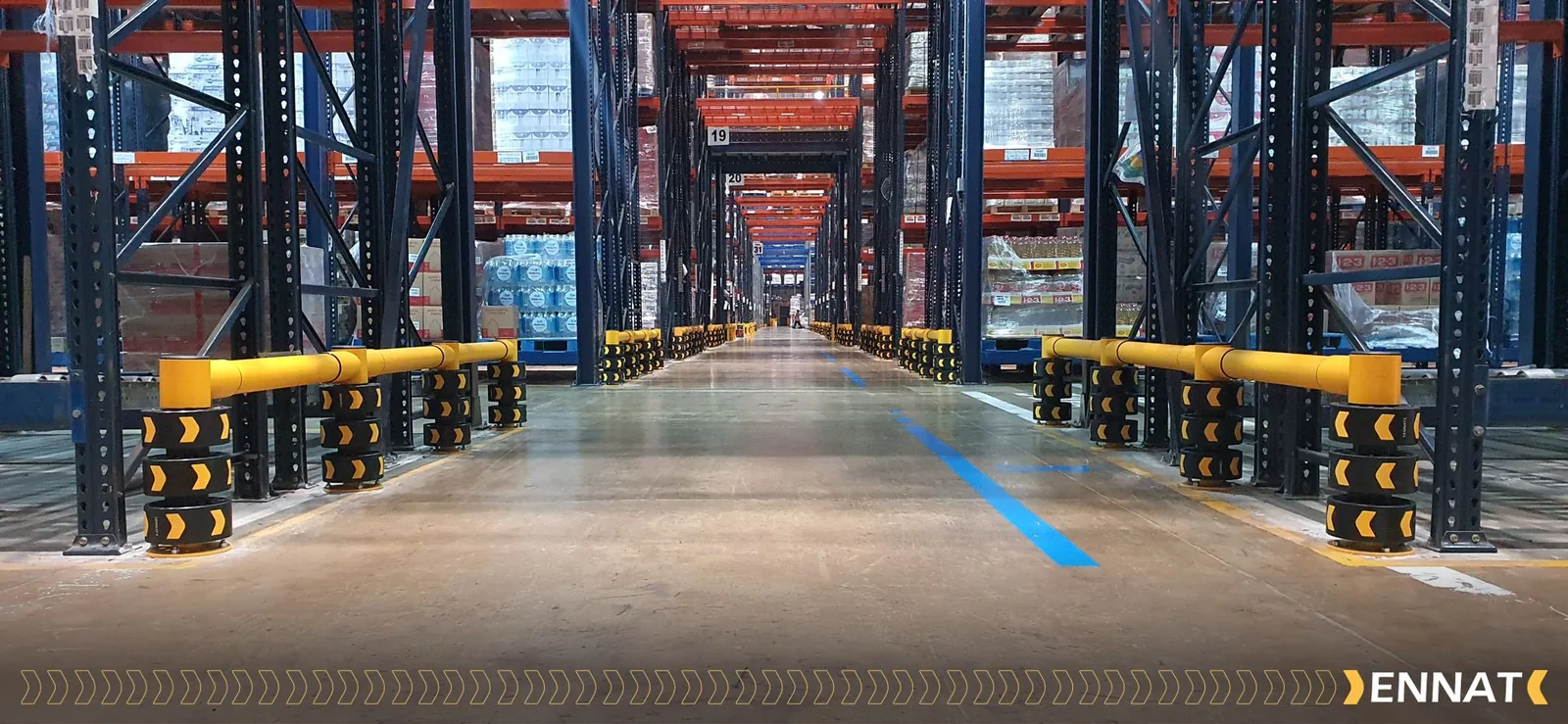 ENNAT impact-absorbing guardrails protecting a warehouse racking aisle